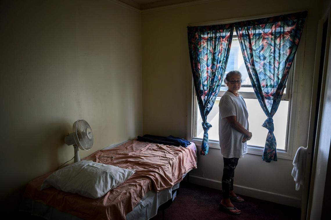After three months sleeping outside, Yolanda Villanueva, 60, received a spot in the Capitol Park Hotel homeless shelter. She stands in her room on Sept. 5, 2019. About a week and a half later, she was able to move to the YWCA Contra Costa in midtown.