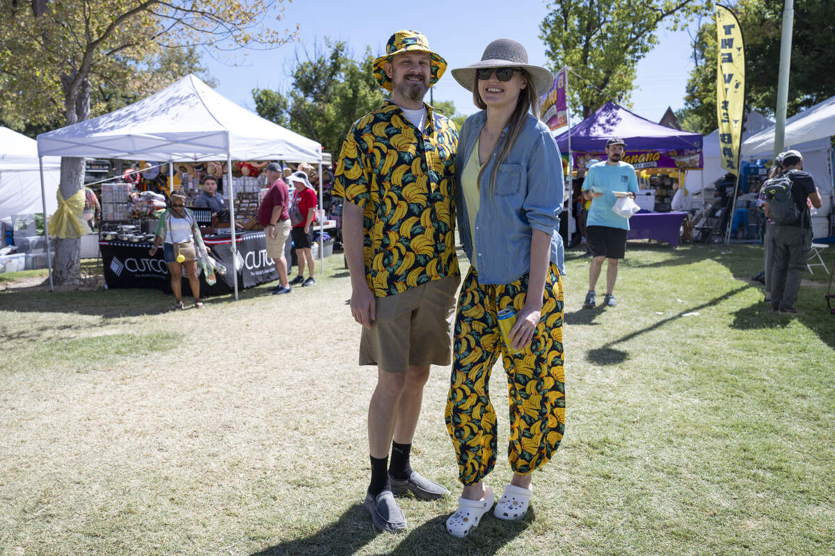 Andrey Kuznetsov, left, and Yelena Ionova wear banana themed outfits at the Sacramento Banana Festival at William Land Park on Sunday.