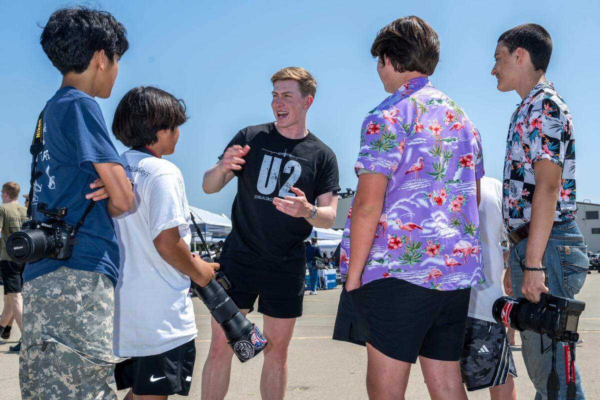 Sam Eckholm, center, greets young fans during the Air & Space Expo at Beale Air Force Base on Saturday.