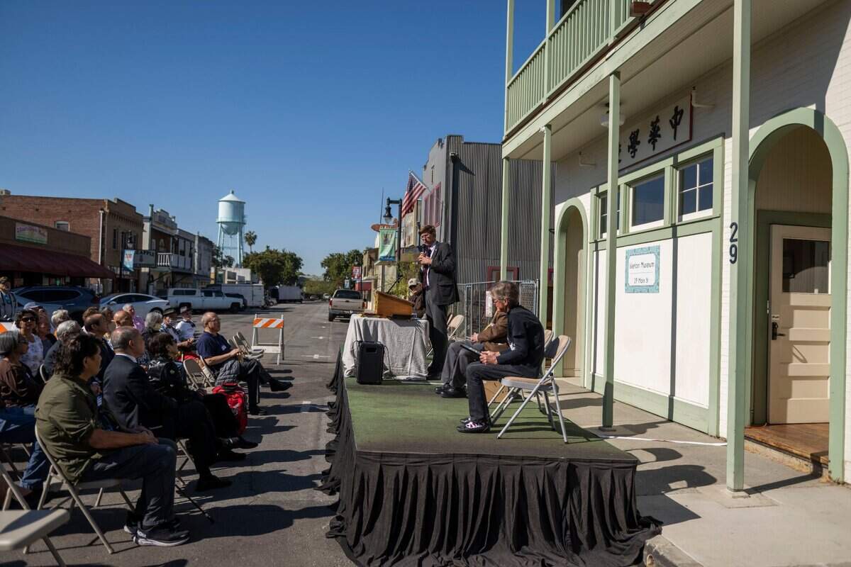 Sacramento County Supervisor Don Nottoli addresses visitors on Thursday at the opening of the Bing Kong Tong building that now serves as a museum and community space for the City of Isleton.