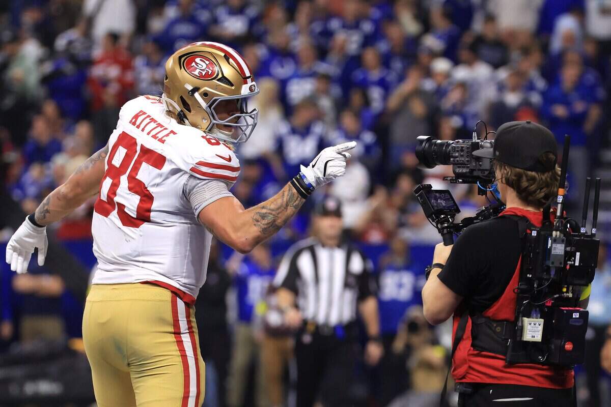 Tight end George Kittle of the San Francisco 49ers celebrates after scoring a touchdown during the second quarter of the game against the Indianapolis Colts at Lucas Oil Stadium on Monday in Indianapolis.