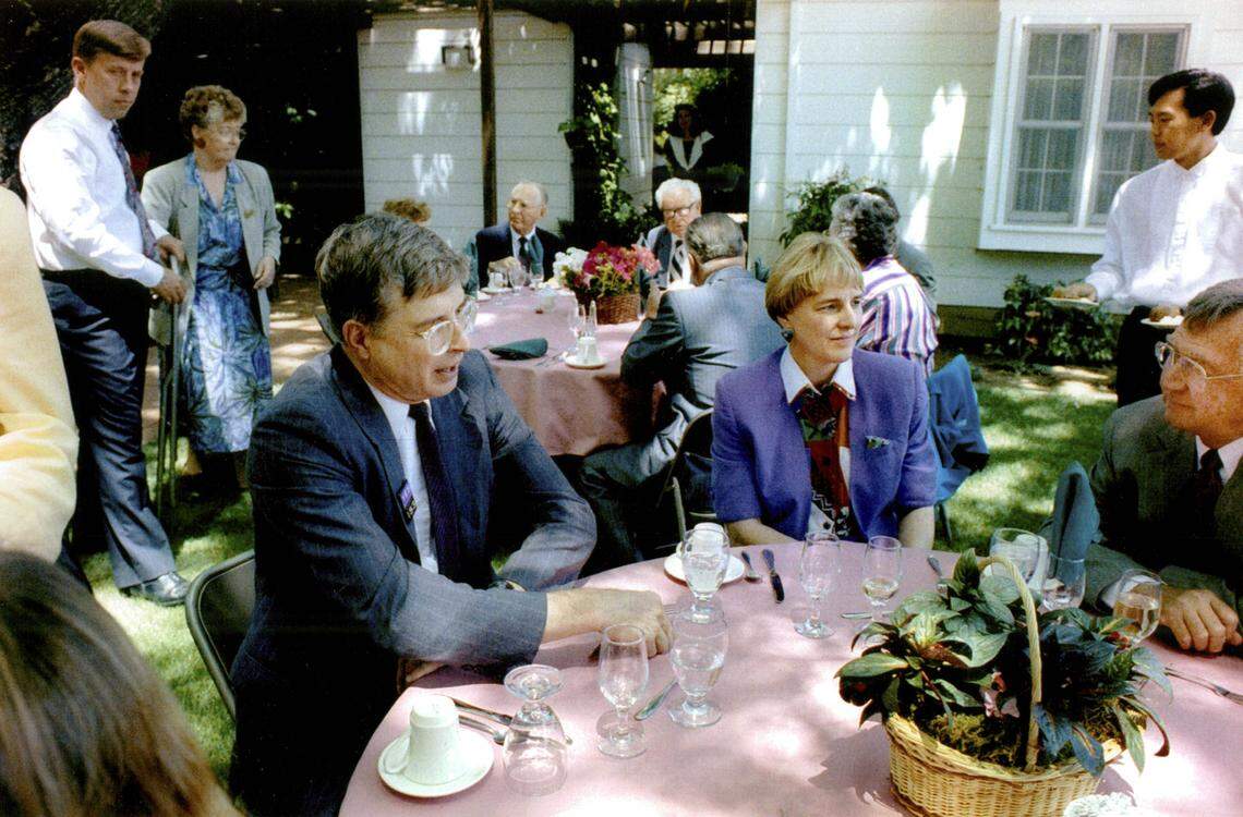 UC Davis Chancellor Ted Hullar talks with Aggie Foundation members at luncheon in his backyard in 1992 as the university grappled with a budget crisis.