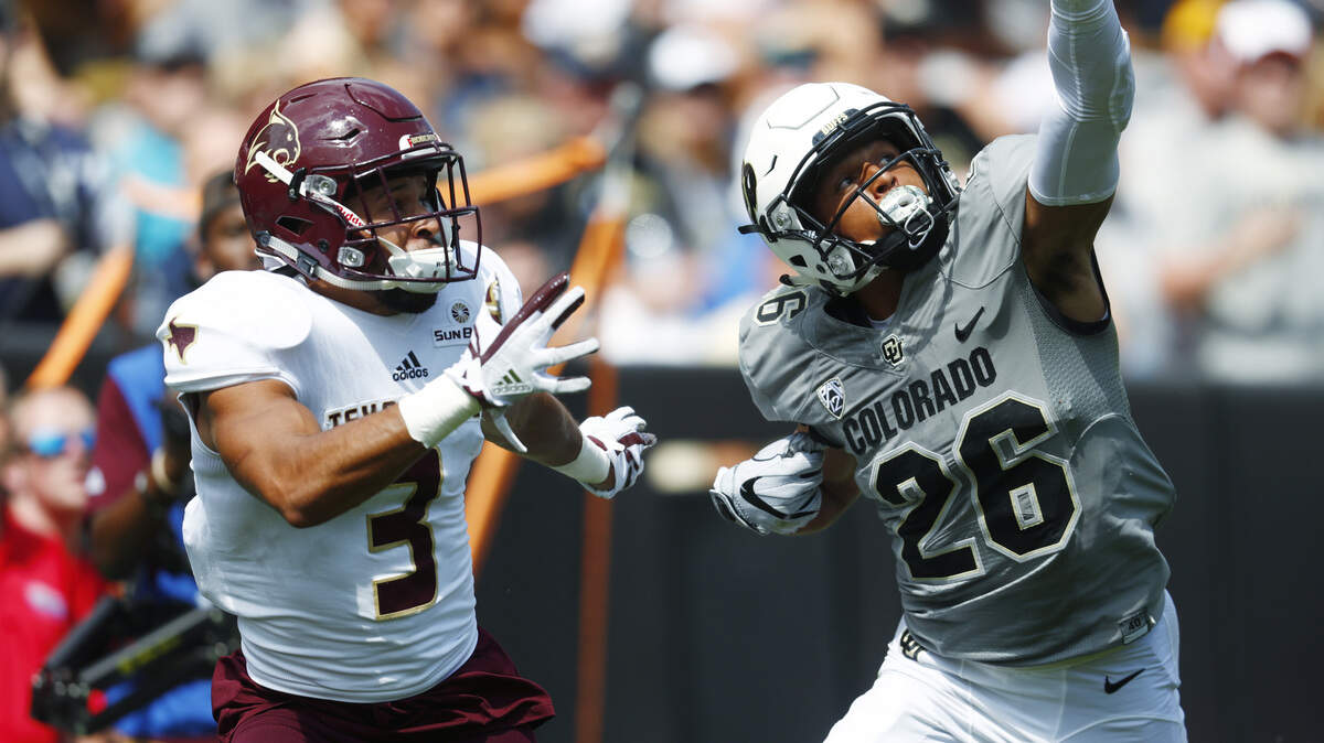 Colorado defensive back Isaiah Oliver, right, deflects a pass intended for Texas State wide receiver Elijah King in the first half of an NCAA college football game in Boulder, Colo., on Saturday, Sept. 9, 2017. Oliver has proven to be a standout performer in the Colorado secondary and also happens to be a rising decathlete in track and field.