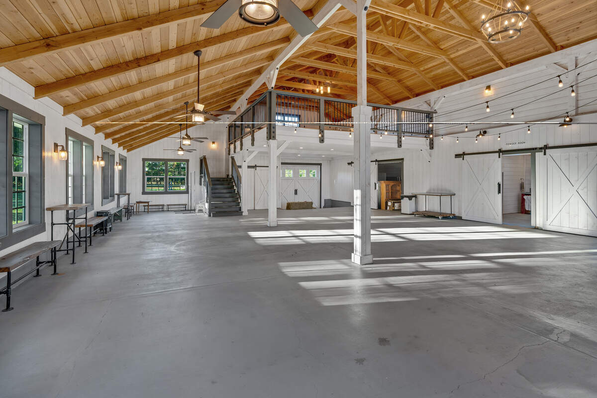 The property’s big barn with a loft doubles as both an event space and practical storage. It has served for everything from church parties to family weddings.