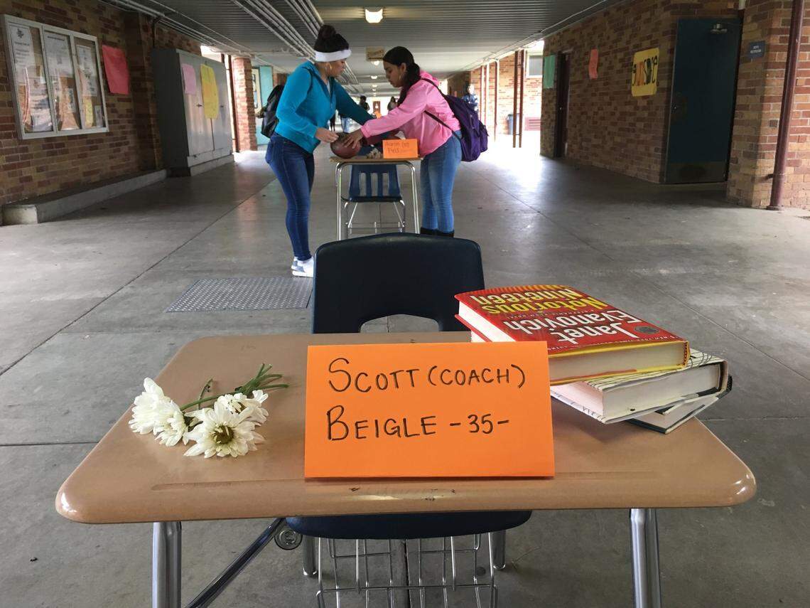 Students at Hiram Johnson High School in Sacramento, Calif., line up 17 desks with the names of victims from the Marjory Stoneman Douglas High School massacre.
