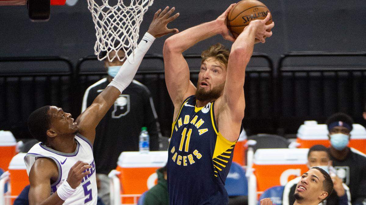 Indiana Pacers forward Domantas Sabonis (11) shoots over Sacramento Kings guard De’Aaron Fox (5) during a game at the Golden 1 Center on Monday, Jan 11, 2021 in Sacramento.