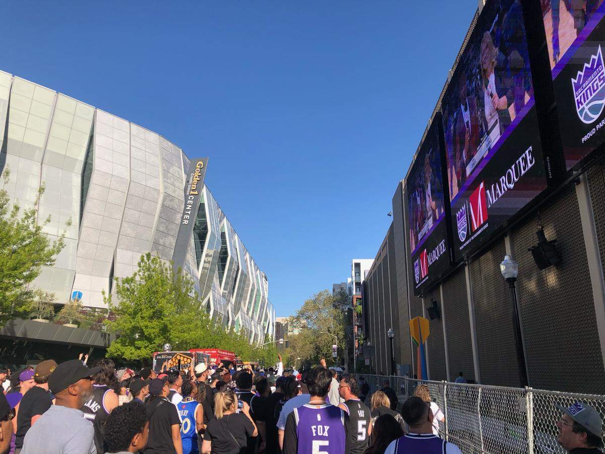 Sacramento Kings fans fill the Section 916 outdoor watch party on L Street in downtown, where they could watch the game on large screens mounted on a privately owned parking garage, at the start of the team’s first game against the Golden State Warriors in the NBA playoffs in April.