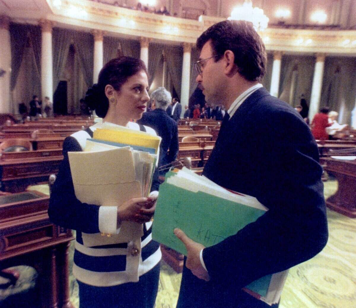 Assemblywoman Jackie Speier, D-South San Francisco, speaks with Assemblyman Richard Katz in the Assembly chambers Wednesday, Jan. 28, 1993.