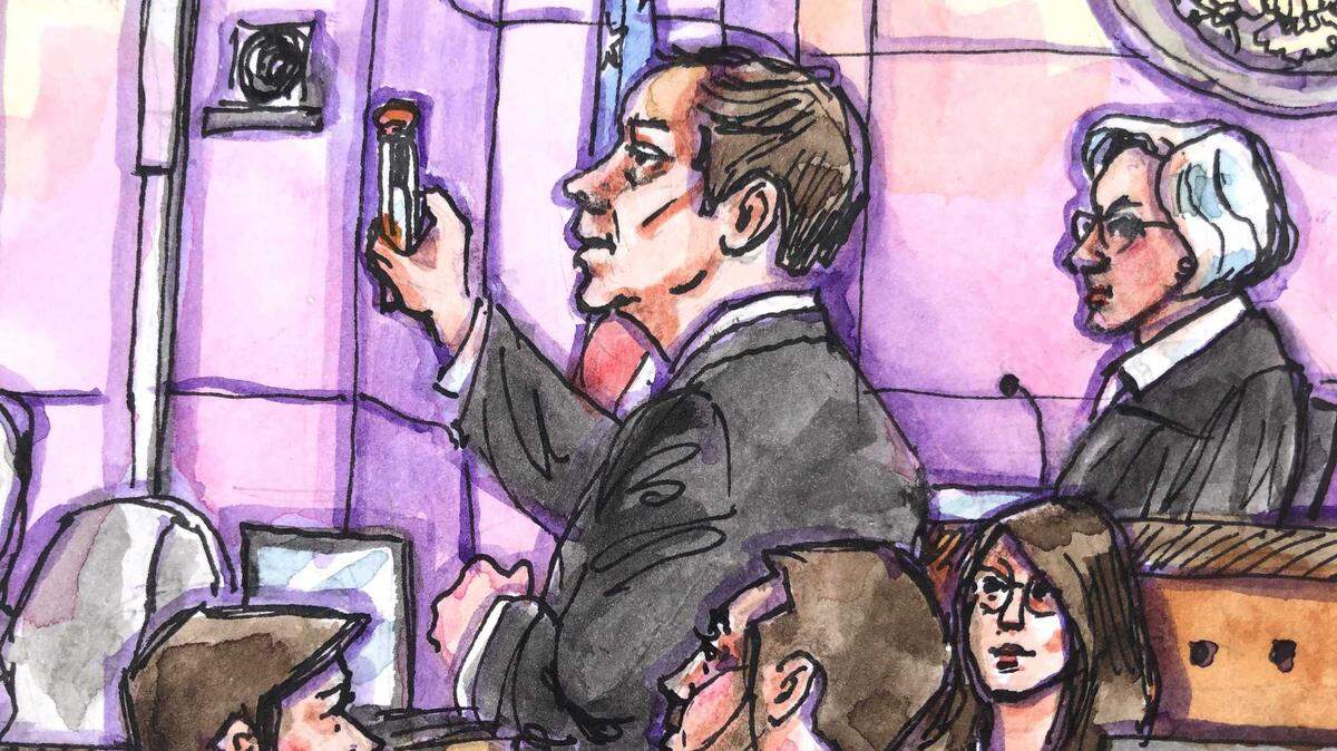 Assistant U.S. Attorney Jason Hitt holds up a knife used to kill Ronald Richardson at California State Prison, Sacramento, during closing arguments on Monday in federal court. William Sylvester, Ronald Yandell and Danny Troxell are on trial in a federal racketeering, drug and murder conspiracy case that involves the Aryan Brotherhood’s involving in the prison system. The case is expected to go to the jury on Wednesday.
