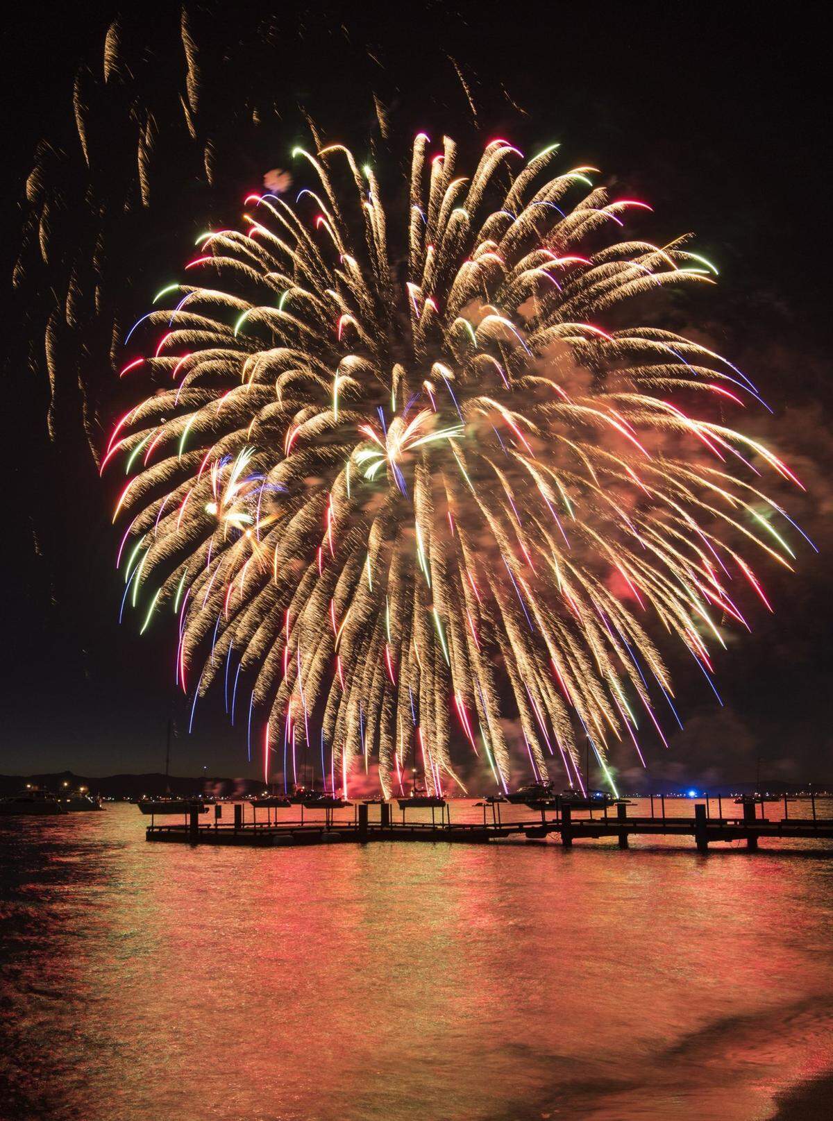 The 2017 fireworks display at Edgewood illuminates Lake Tahoe.