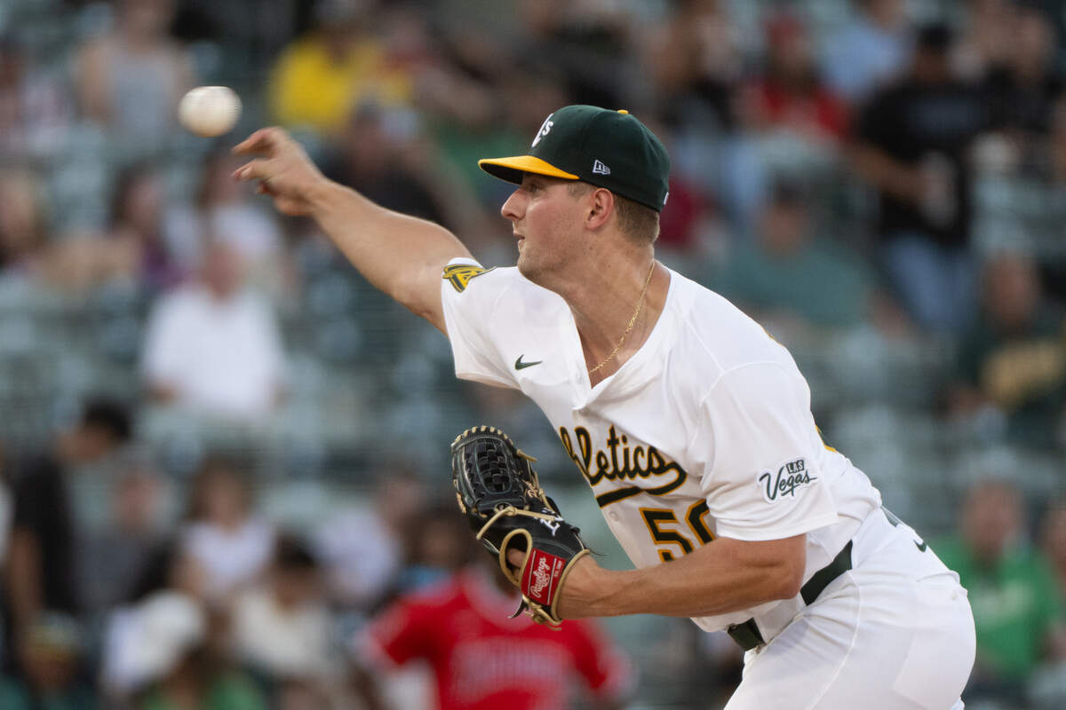 Athletics pitcher Jack Perkins throws to Los Angeles Angels shortstop Zach Neto (9) in the first inning during a game at Sutter Health Park on Friday in West Sacramento.