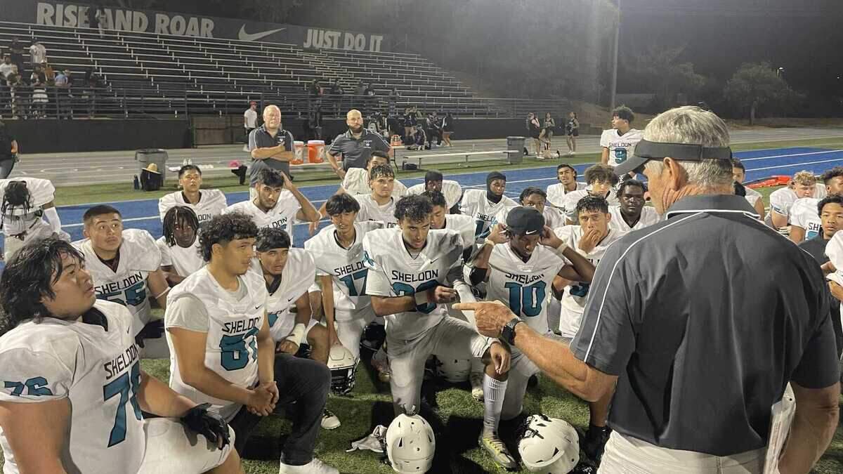 Sheldon coach Chris Nixon talks with his team after a 27-6 victory over Capital Christian in the season opener on Friday.
