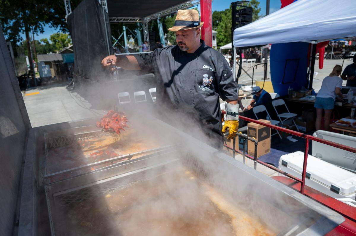 Toby Tayeh of Sharkey’s Chicken and Fish boils crawdads at the City of Isleton Crawdad Festival on Sunday.