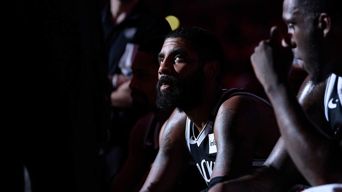 Brooklyn Nets guard Kyrie Irving (11) listens during a time out in the second half of an NBA basketball game against the Washington Wizards, Saturday, Feb. 1, 2020, in Washington. The Wizards won 113-107. (AP Photo/Nick Wass)