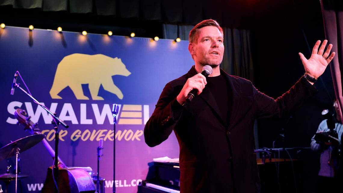 Former Rep. Eric Swalwell addresses supporters of his campaign for governor in San Francisco during the California Democratic Party 2026 State Convention on Feb. 20, 2026.  Swalwell, who has withdrawn from the race and resigned his congressional seat, is under investigation by the U.S. Department of Justice, a DOJ source confirmed Thursday, April 16, 2026. 