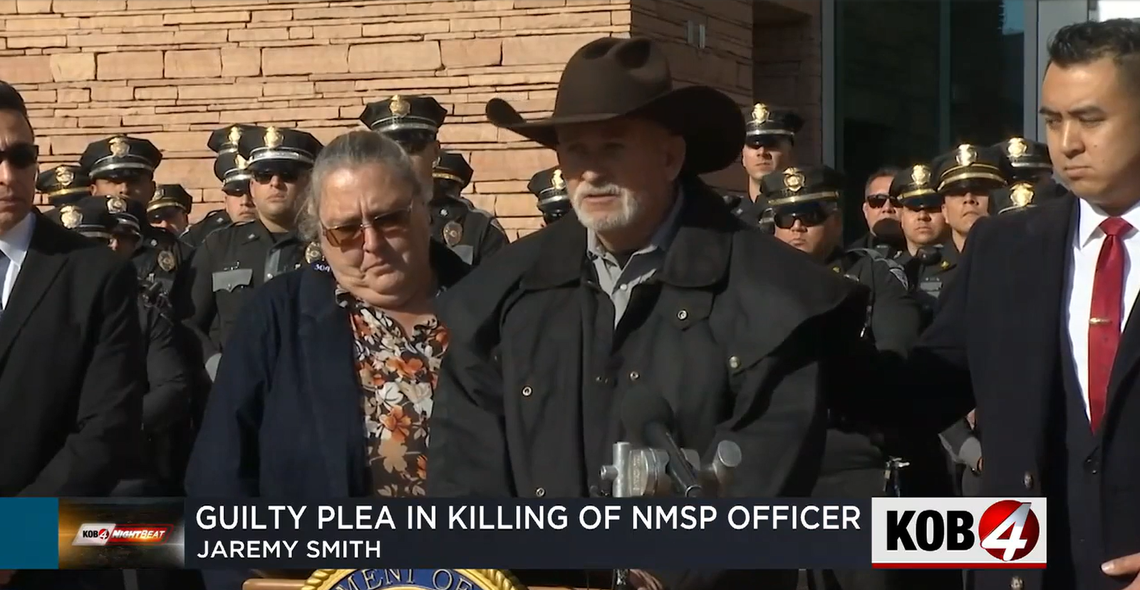 In this photo, Hare’s mother, Terry Hare (left), his father, Jim Hare (center), and U.S. Attorney Alexander Uballez (right) are seen at a Jan. 17 news conference.