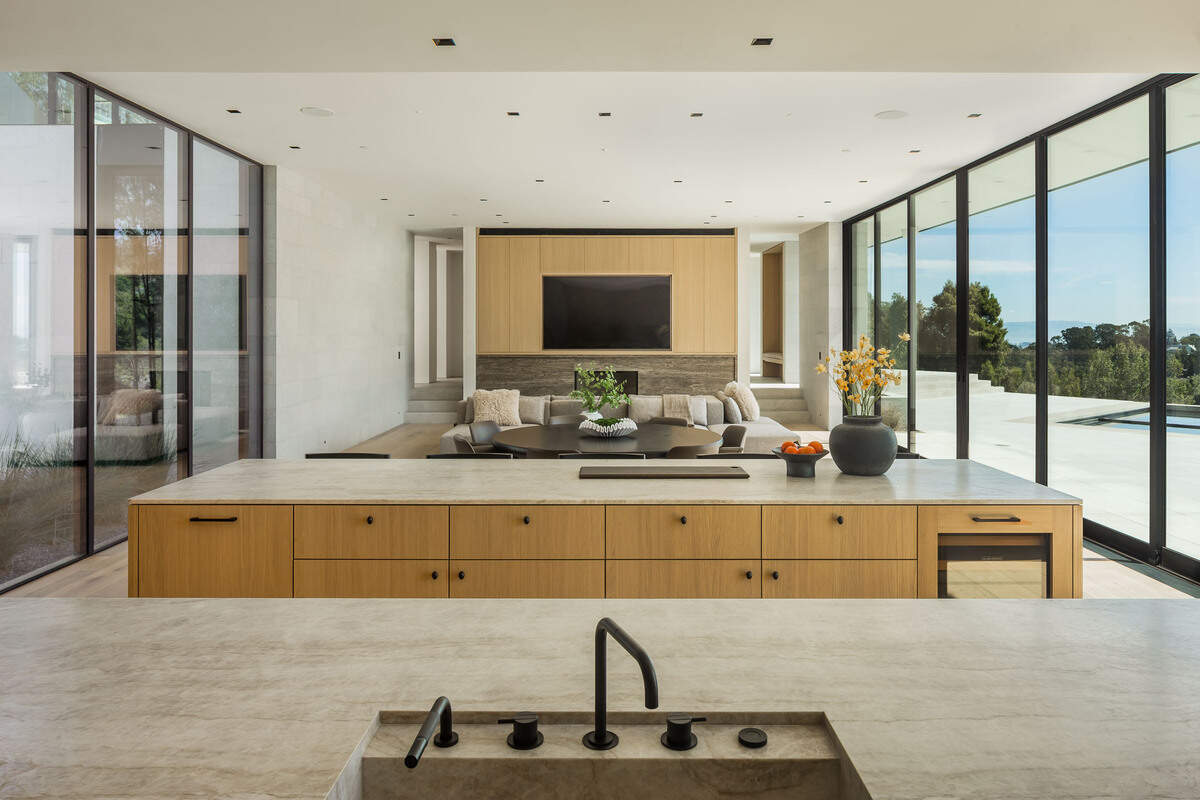 A “statement kitchen” features Gaggenau appliances and Sub-Zero refrigeration, plus full-surface induction and steam ovens. There’s a dirty kitchen, as well.