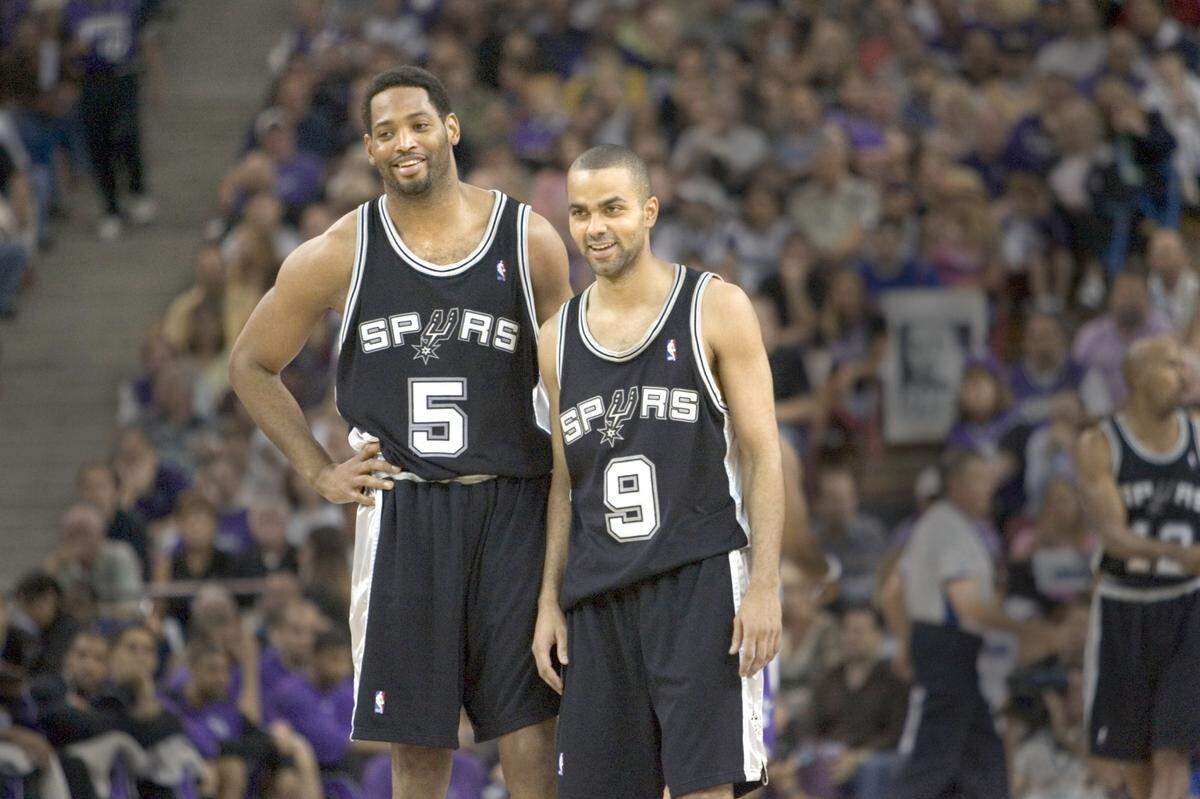 Robert Horry and Tony Parker enjoy the third quarter of Game 6 of the first round of Western Conference playoff series between the Sacramento Kings and San Antonio Spurs at Arco Arena on Friday, May 5, 2006.