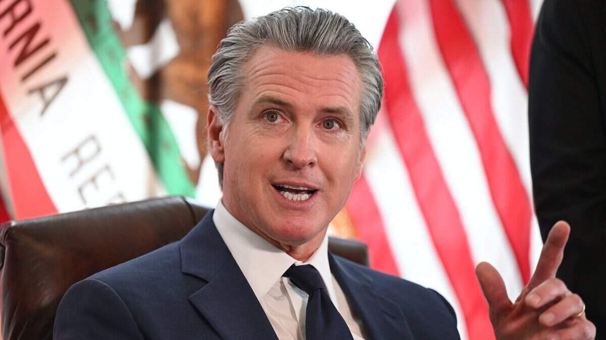 Gov. Gavin Newsom speaks during the signing of Senate Bill 73 in Sacramento on May 27, 2026. The bill bans police officers from inspecting election equipment or allowing people to assist them without a court order.