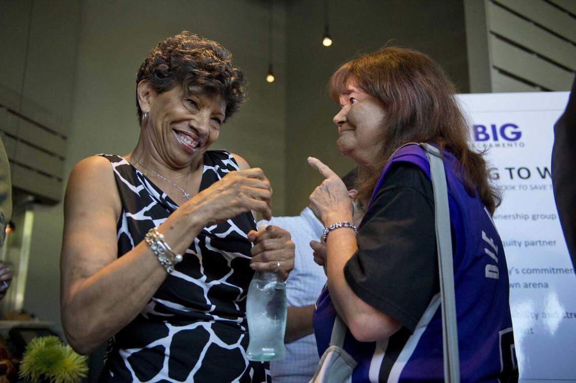 Georgia West is congratulated by Barbara Rust known as the “Sign Lady” before her son Mayor Kevin Johnson announces the NBA rejected the Kings’ relocation to Seattle in 2013. Georgia Rose Peat West died peacefully Monday, Dec. 23, 2024, at her Oak Park home with her sons, former Sacramento Mayor Kevin Johnson and marketing executive Ronnie West, beside her.