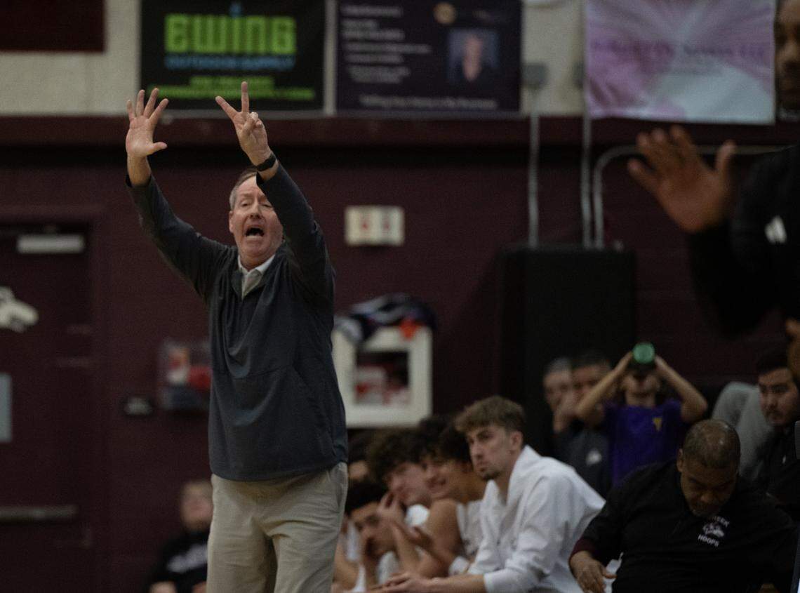 Woodcreek Timberwolves head coach Drew Hibbs yells out a play in the first half game against the Christian Brothers Falcons on Thursday in Roseville.