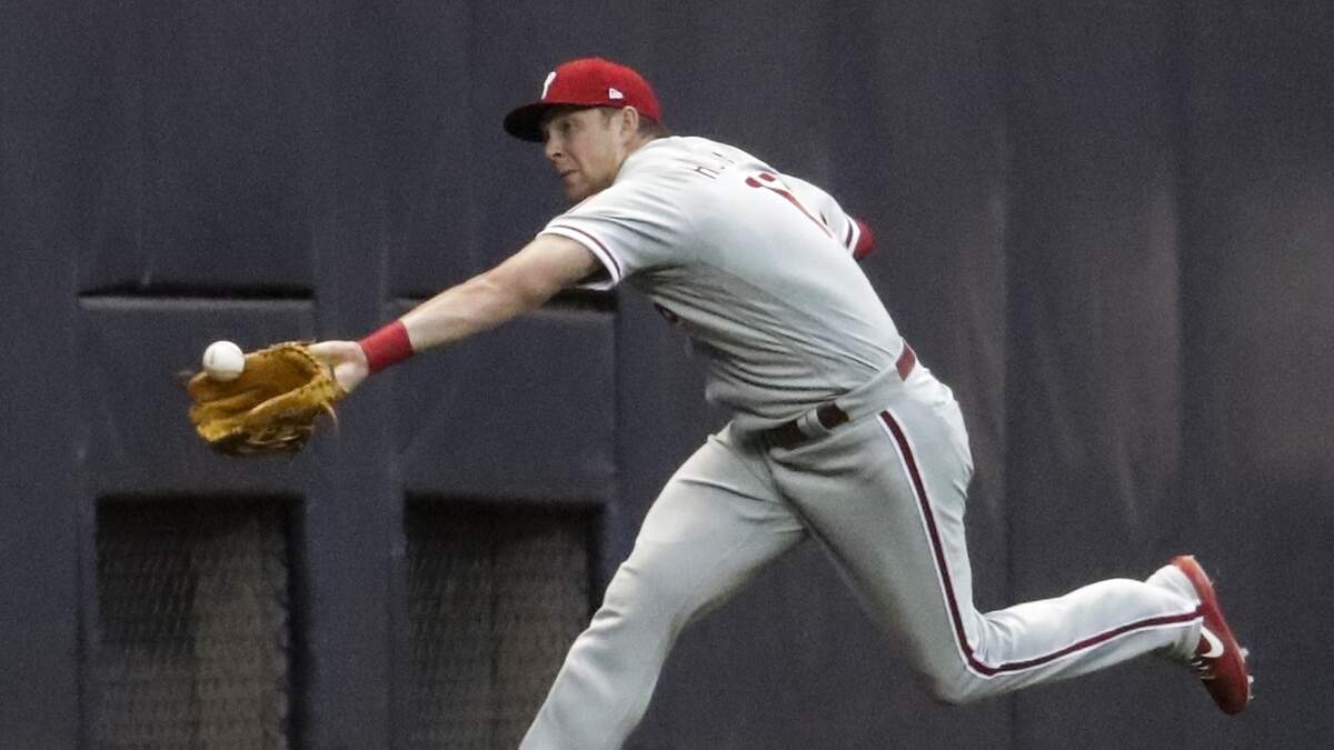 Philadelphia Phillies outfielder Rhys Hoskins slammed into the wall trying to make a catch Tuesday. The Sacramento State and Jesuit High product, who suffered a broken jaw earlier this season, said "I'm fine" after Tuesday's game.