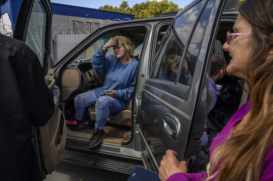 Laurane Ivey, 37, gets ready to help move a friends belongings and dog to transitional housing after leaving the Railroad Drive shelter on Tuesday, April 30, 2019, in Sacramento. Ivey has been living in her car a week before the shelter closed. She says they wouldn’t let her back in after she took several days to go to her daughter’s funeral. Her daughter was hit by a drunk driver and spent several days in a coma, suffered 14 broken bones and died. Ivey’s mother Gwen Mayse, 59, right, is also living in a car.