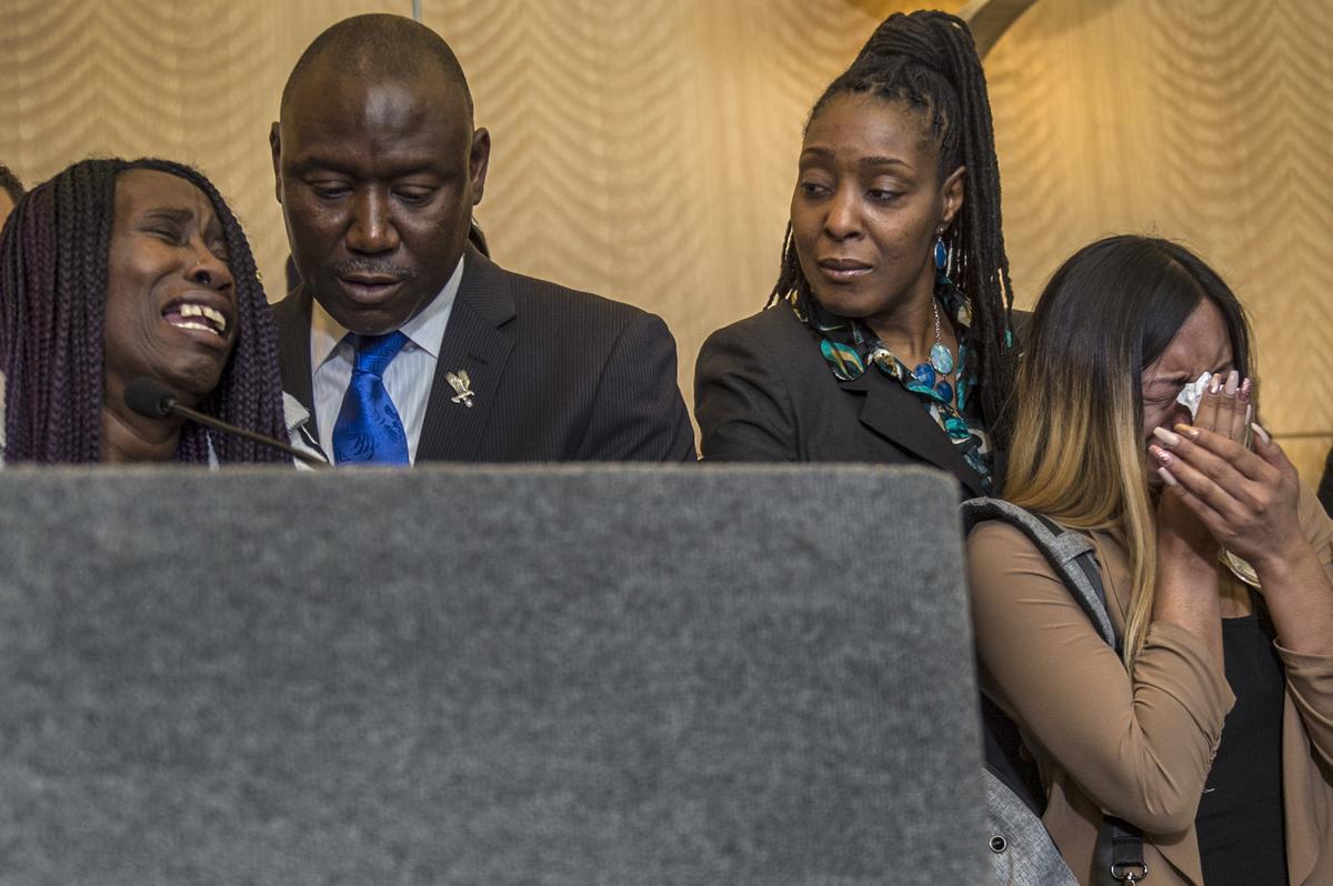 An emotional Sequita Thompson, left, speaks out at a news conference, asking for justice in the police shooting death of her grandson Stephon Clark with attorney Ben Crump at City Hall in Sacramento, Calif., on Monday, March 26, 2018. At right, Salena Manni, 22, Clark's fiancee and mother of his two small children, reacts.