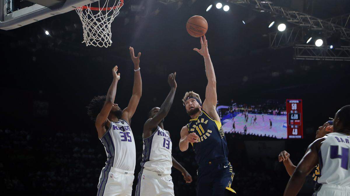 Indiana Pacers’ player Domantas Sabonis aims for the net during a match against Sacramento Kings at the NBA India Games 2019 in Mumbai, India, Friday, Oct. 4, 2019. (AP Photo/Rajanish Kakade)