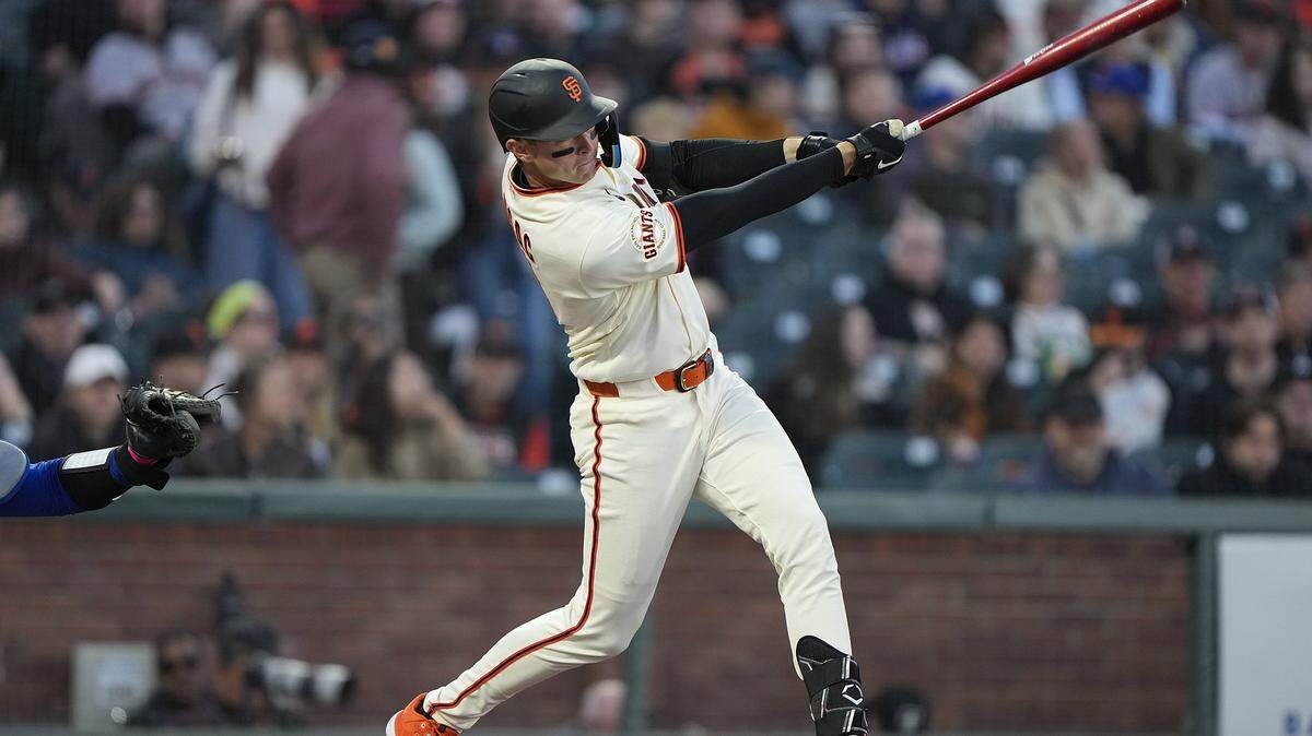 Daniel Susac of the San Francisco Giants hits a single against the New York Mets, his first MLB hit, in the bottom of the second inning at Oracle Park on Thursday in San Francisco.