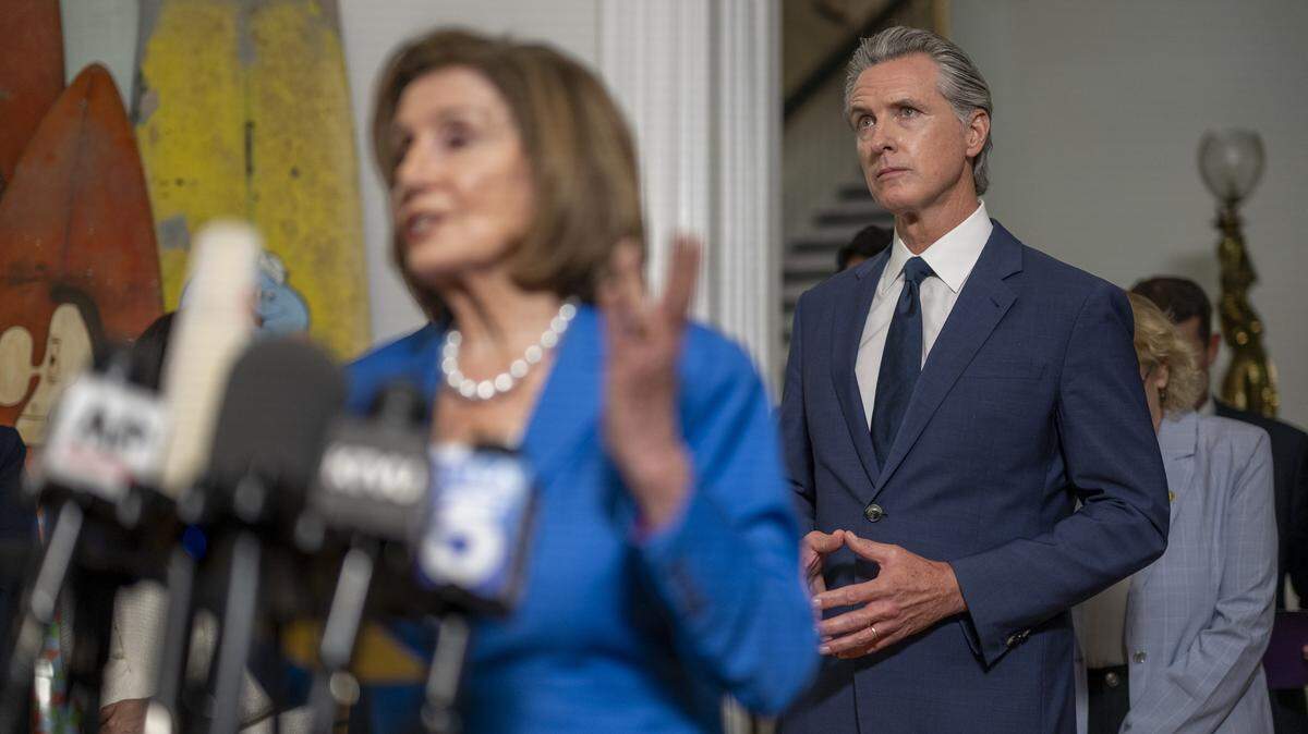 Speaker Emerita Rep. Nancy Pelosi, D-San Fransisco,  delivers remarks during a news conference on redistricting at the Governor's Mansion in downtown Sacramento on Friday, Aug. 8, 2025, as Gov. Gavin Newsom looks on.