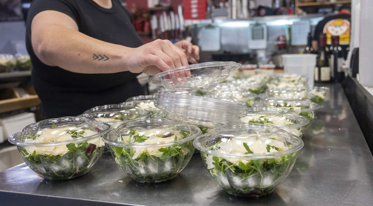 Staff help prepare salads before Bocce’s pop-up event at Origami Asian Grill in Sacramento on Sunday, June 7, 2026.