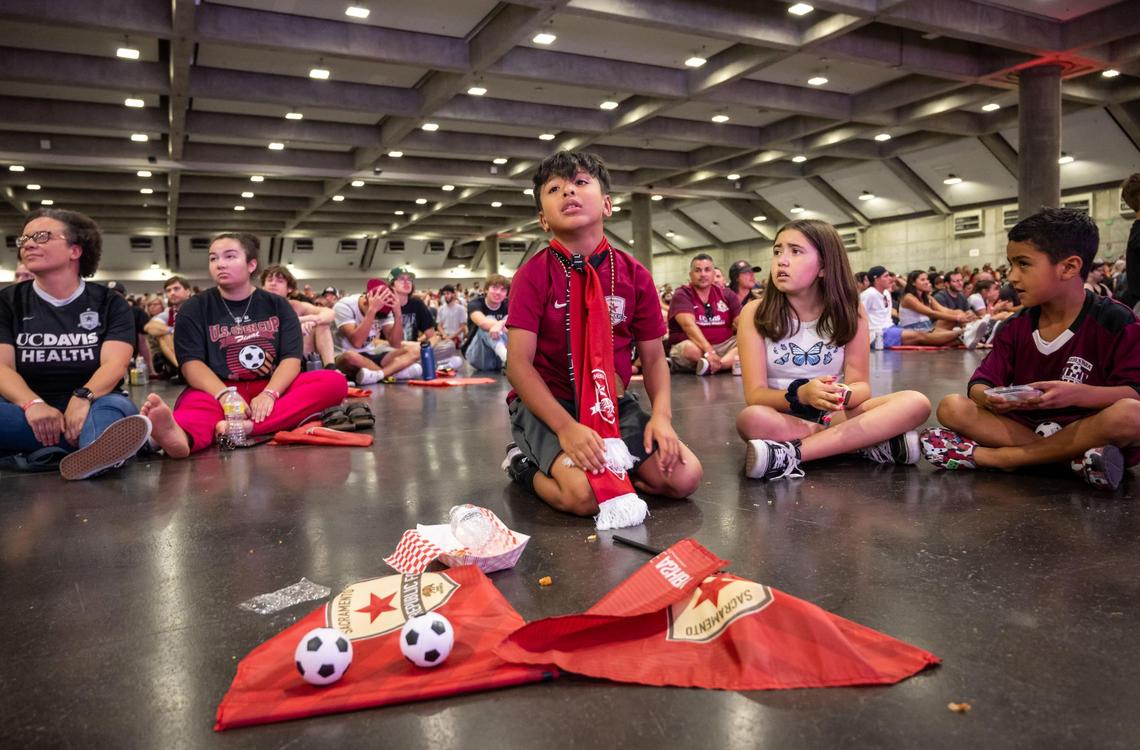 Sacramento Republic FC fan Isaiah Hernandez, 8, of Sacramento, reacts during a watch party at SAFE Credit Union Convention Center after Orlando City SC scores late in the second half at the U.S. Open Cup final Wednesday, Sept. 7, 2022, at Exploria Stadium in Orlando. His father, Roy Hernandez, said his son is a huge fan. “We’re season ticket holders, the whole family,” he added. Orlando beat Sacramento, 3-0, after a largely scoreless game.