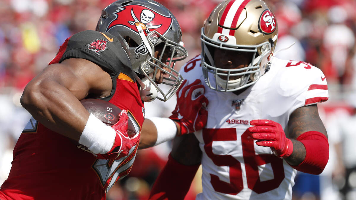 Tampa Bay Buccaneers tight end O.J. Howard (80) runs into San Francisco 49ers middle linebacker Kwon Alexander (56) during the first half an NFL football game, Sunday, Sept. 8, 2019, in Tampa, Fla. (AP Photo/Mark LoMoglio)