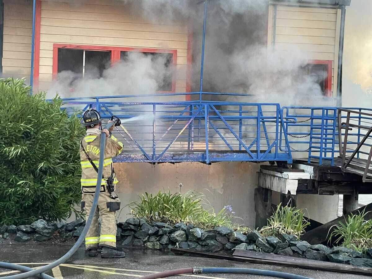 A suspected arson fire Wednesday July 6, 2022, destroyed historic Moore’s Riverboat Restaurant and Marina and its docks in Isleton, California.