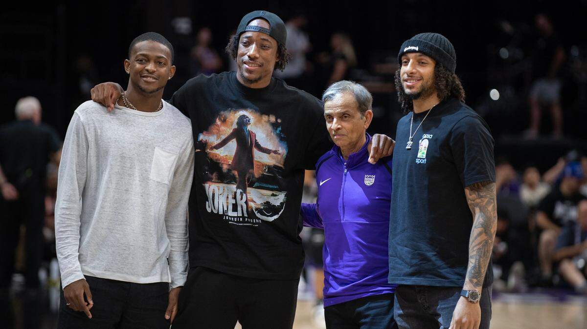Newest Sacramento King, DeMar DeRozan, with De’Aaron Fox, left, Kings co-owner, Vivek Ranadivé, and 2024 draft pick, Devin Carter, right, during the California Classic contest between the Kings and the Chinese Men’s summer league team on Saturday, July 6, 2024 at the Golden 1 Center.