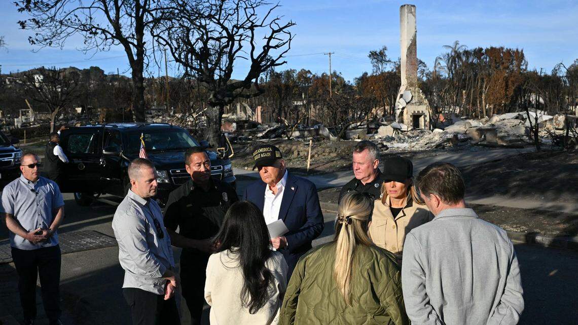 President Donald Trump and first lady Melania Trump meet residents as they tour a fire-affected area in the Pacific Palisades on Friday, Jan. 24, 2025.