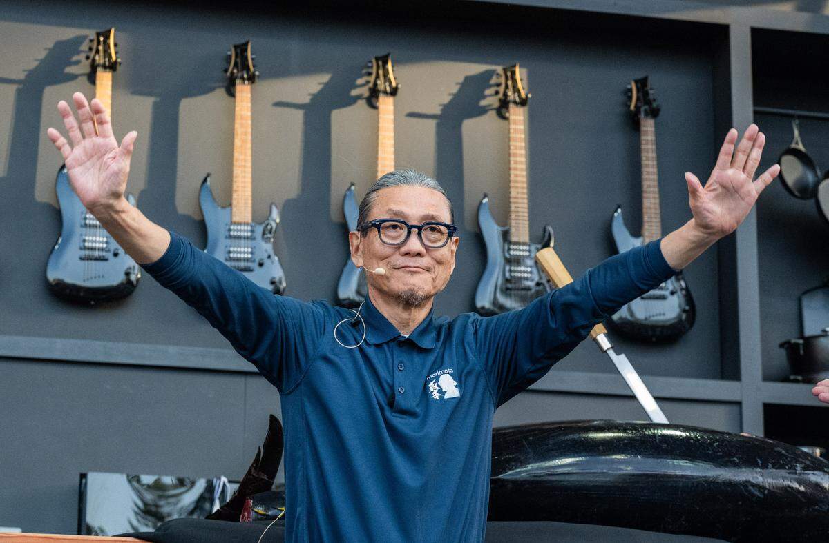 Celebrity chef Masaharu Morimoto, celebrating his 70th birthday, greets the audience before a cooking demonstration at the BottleRock music festival in Napa on Friday, May 23, 2025. 