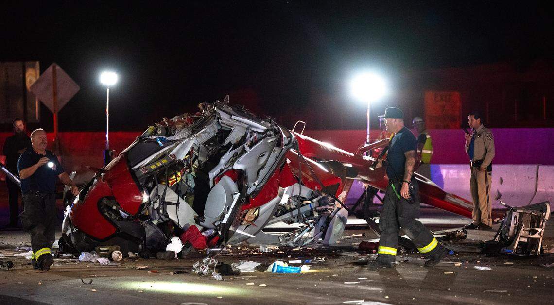 Sacramento firefighters investigate a crashed helicopter on Highway 50 in East Sacramento on Monday, Oct. 6, 2025.