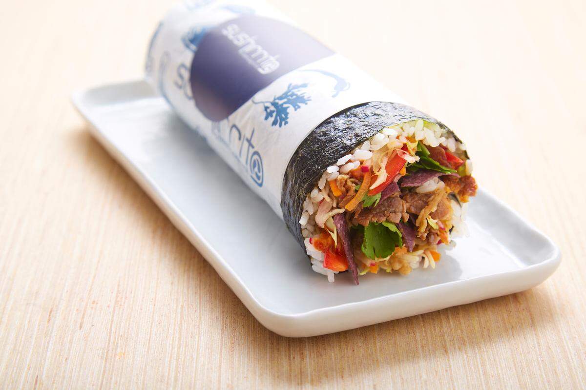 The Cowboy at Sushiritto comes with kabayaki beef, blue corn chips, veggies and “kimichurri sauce.”