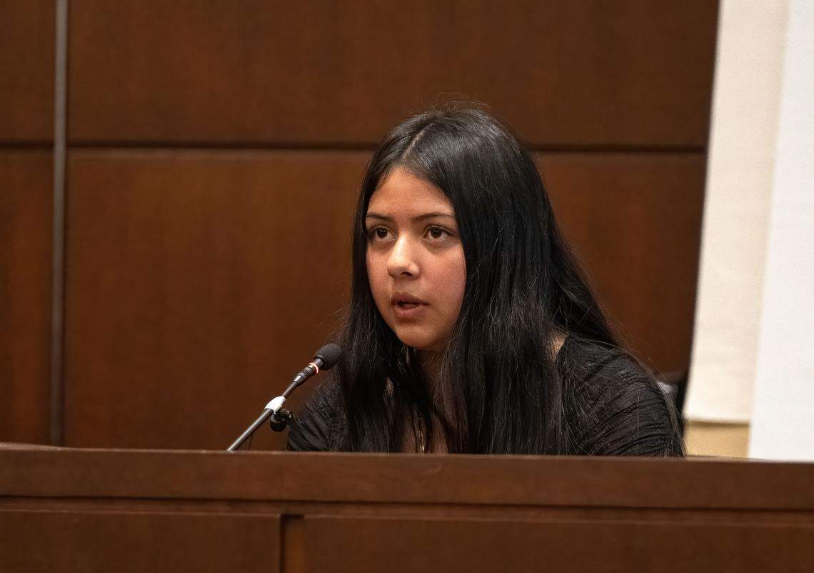 Mia Reales Dominguez, 13, testifies in the murder trial of her brother, Carlos Reales Dominguez, in Yolo Superior Court on Monday. Former UC Davis student Carlos Reales Dominguez is accused of killing two and injuring a third in a series of knife attacks.