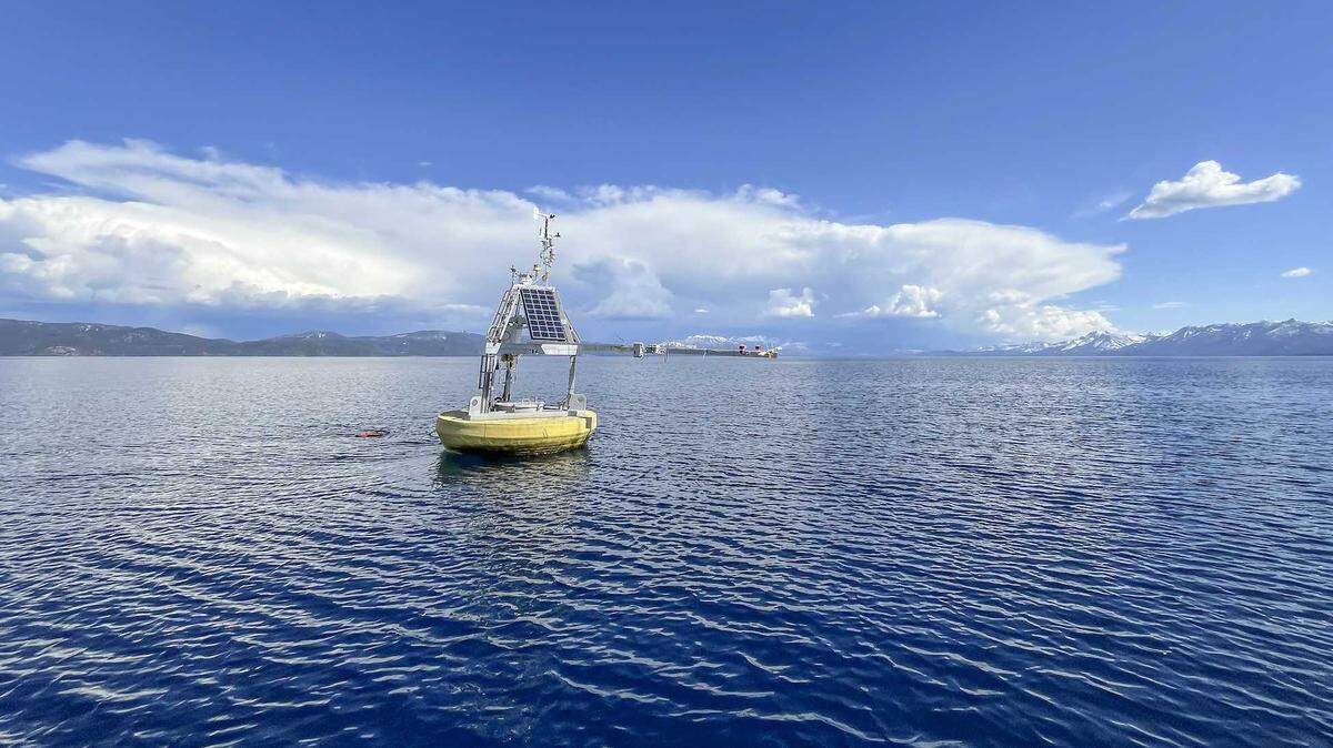Researchers monitor lake clarity by lowering a 10-inch white disk, called a Secchi disk, into the water and measuring the lowest depth at which it still remains visible.