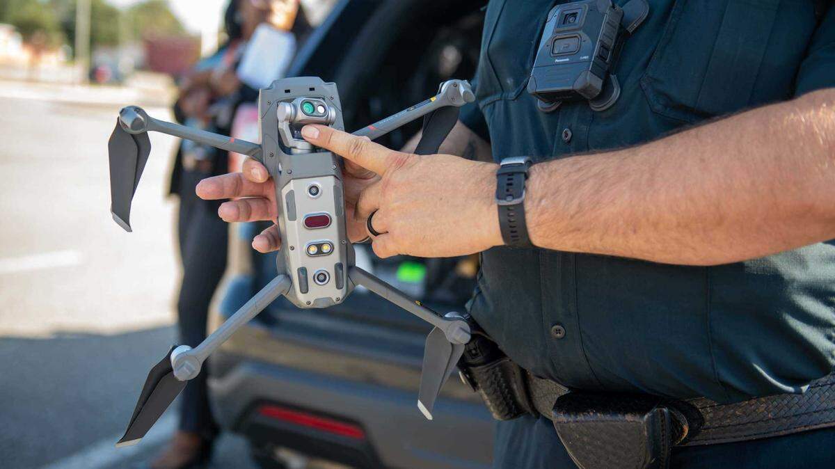 A law enforcement officer shows off a police drone in Jackson, Tennessee, in 2023.