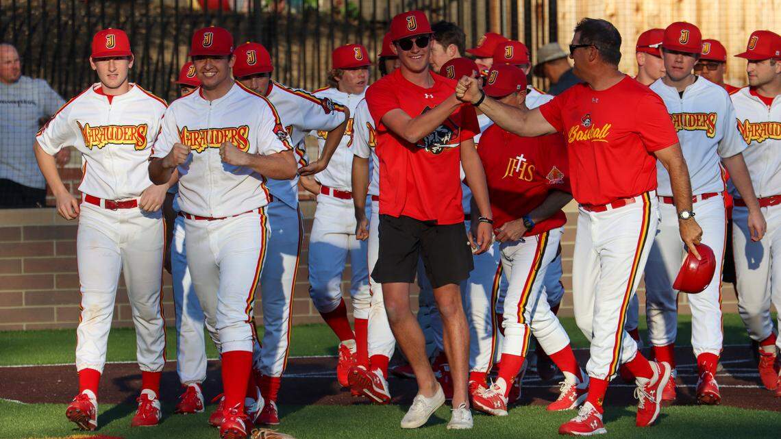 Members of the Jesuit baseball team celebrate after defeating De La Salle, the top-ranked team in the nation, on Friday in Carmichael. The Marauders beat the visiting Spartans 4-1.