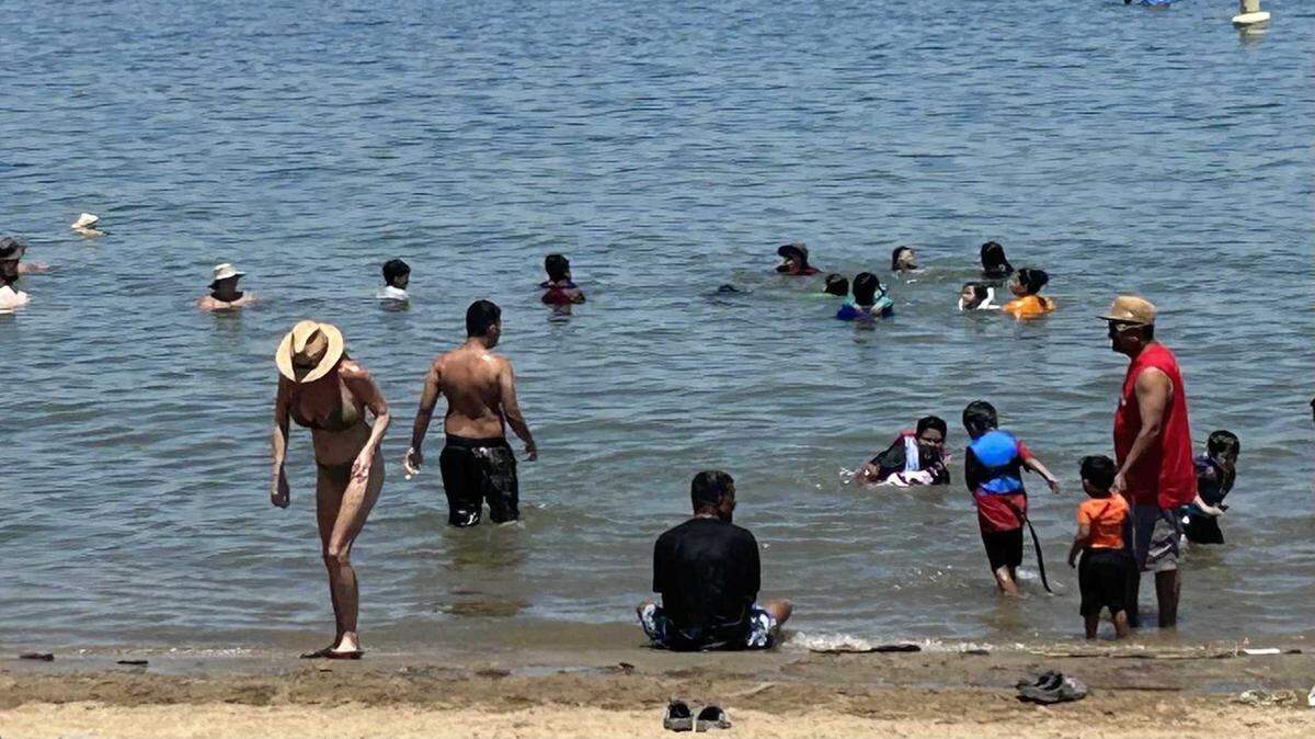Families and friends splashed in the cool waters of Folsom Lake over Independence Day weekend, trying to avoid the excessive heat during the hottest day yet of 2023.