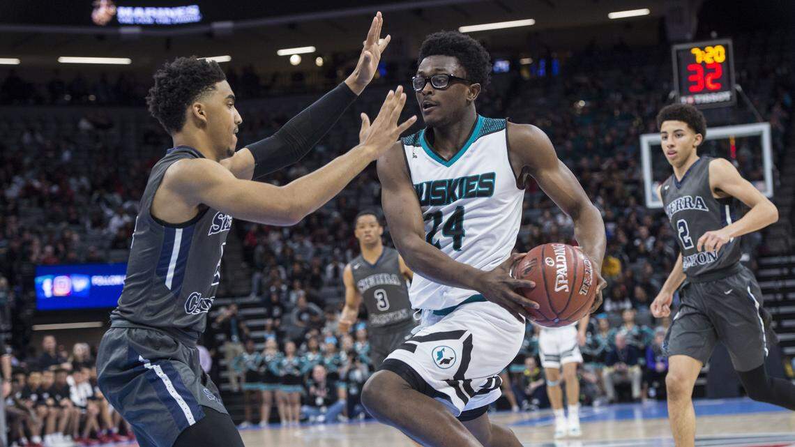 Sheldon High School forward Ronald Agebsar (24) drives to the basket against Sierra Canyon High School of Chatsworth during the CIF Boys Open Division Championship at  Golden 1 Center in Sacramento, Calif. on Saturday, March 24, 2018.