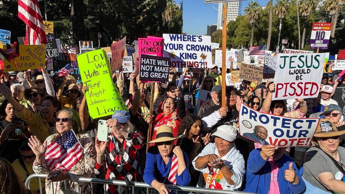 Demonstrators protest the Trump administration during a "No Kings" protest in Sacramento on Saturday.