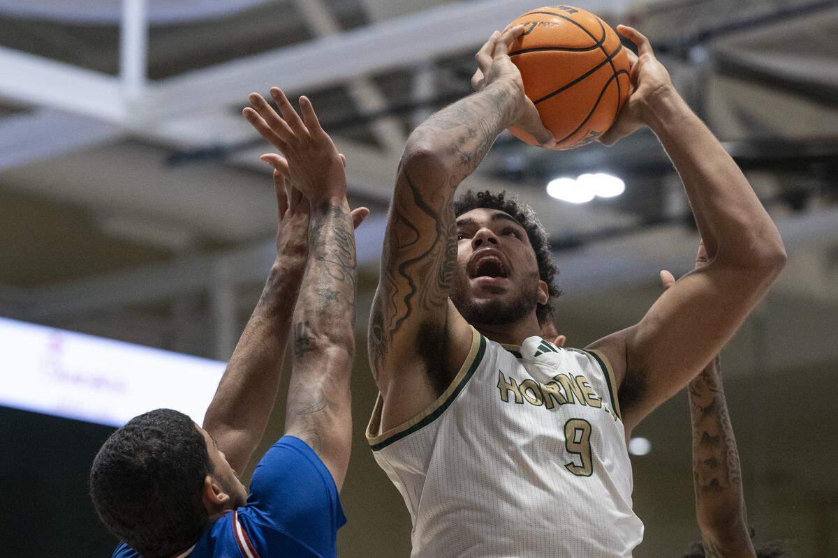 Sacramento State forward Jeremiah Cherry (9) shoots during a game between Sac State and Presbyterian at Hornet Pavilion in Sacramento on Sunday, Nov. 16, 2025.