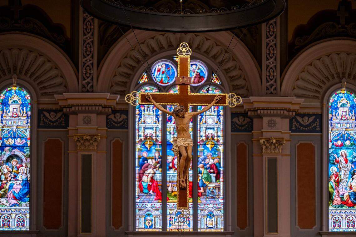 A crucifix that hangs above the altar at the Cathedral of the Blessed Sacrament in downtown Sacramento is suspended with aircraft cables.