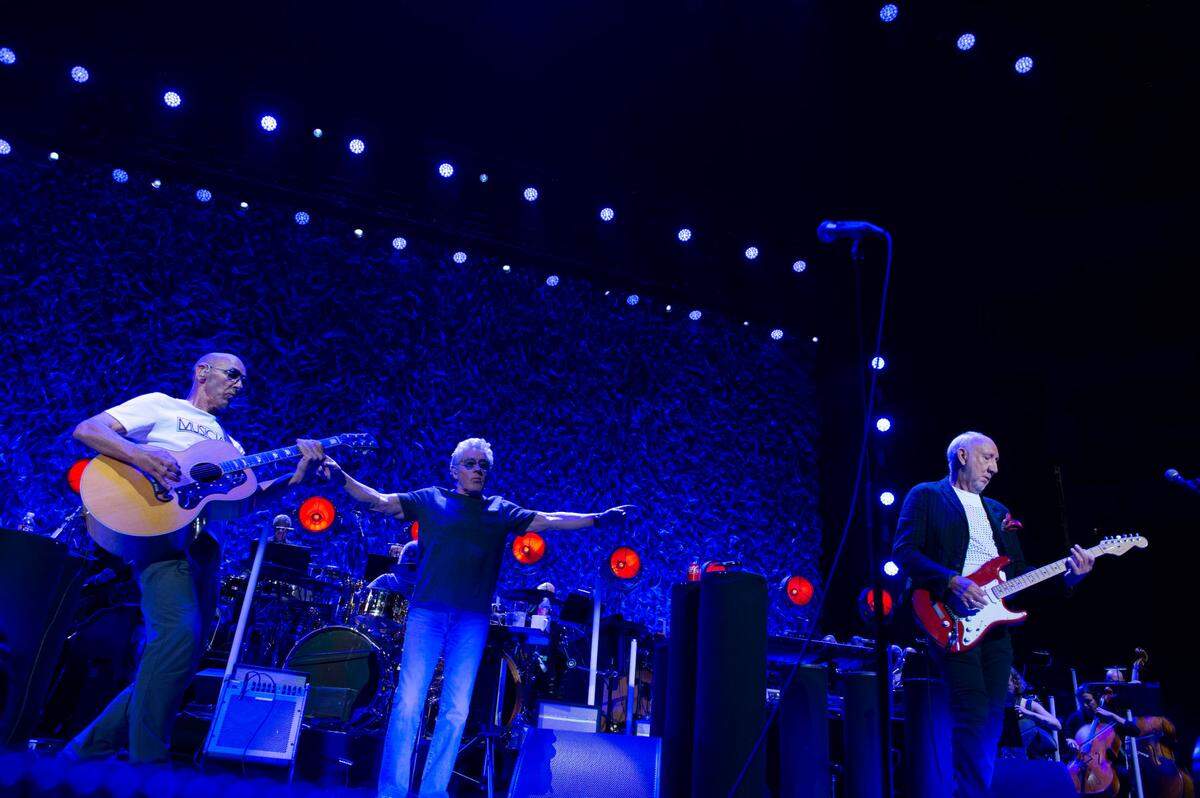 Pete Townshend’s brother, Simon Townshend, left, performs with Roger Daltrey, center, and Pete Townshend during The Who Hits Back! tour stop in Sacramento on Wednesday at Golden 1 Center.
